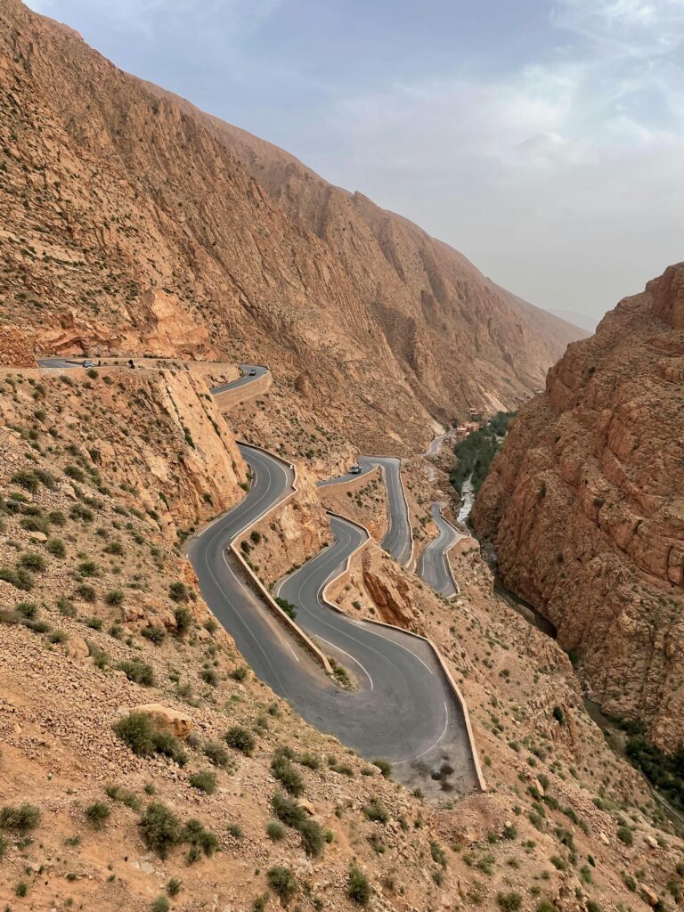 Scenic view of a winding road cutting through a canyon in Drâa-Tafilalet, Morocco.