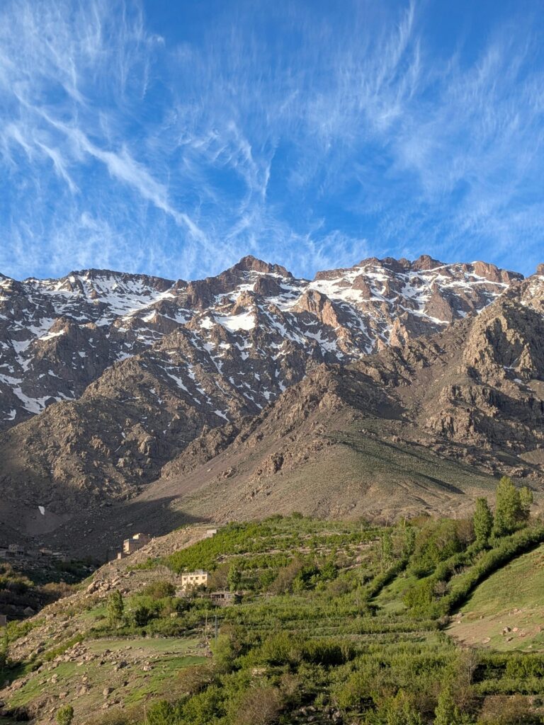 Breathtaking view of Tachdirt in the Atlas Mountains, Morocco with clear blue skies.